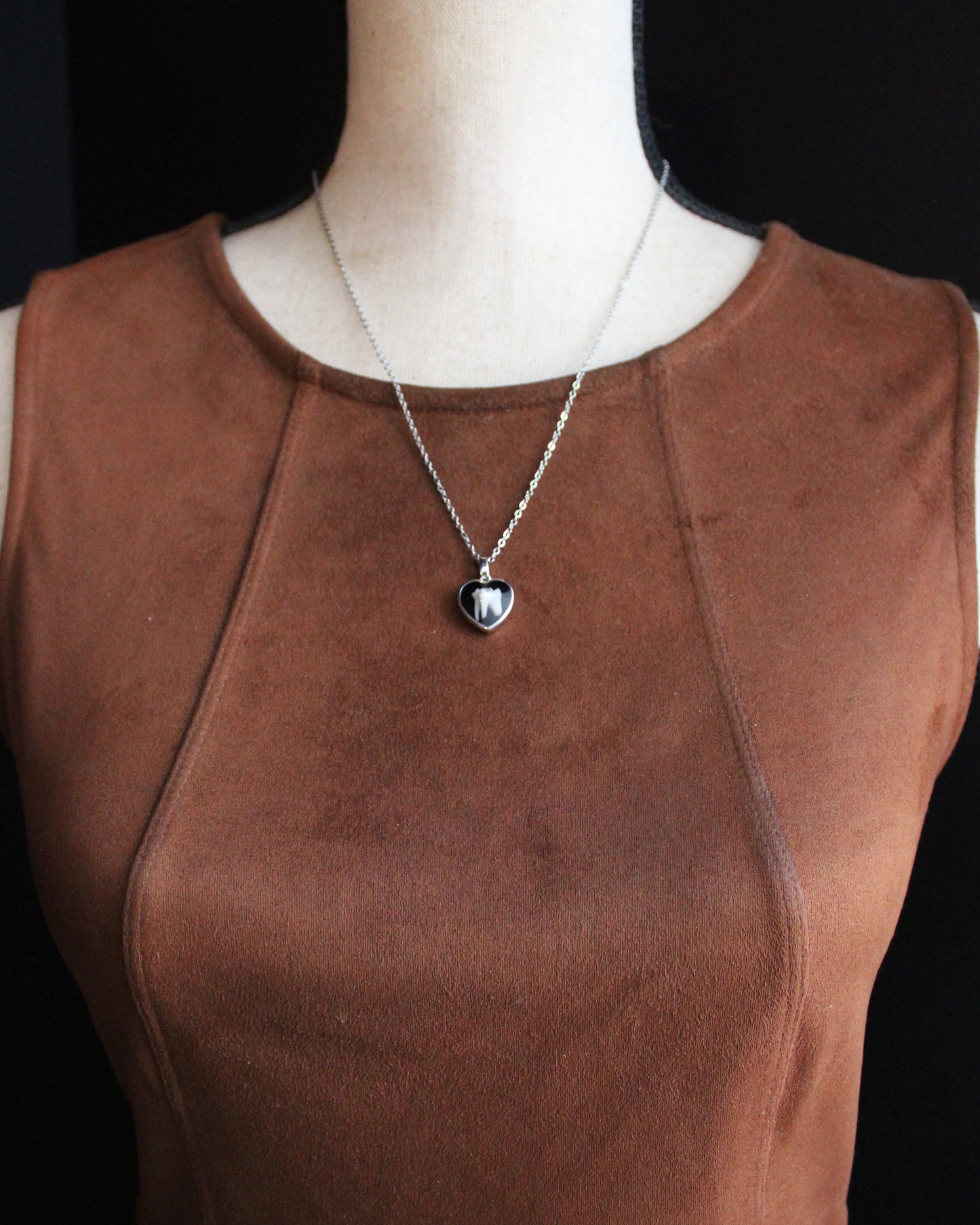 Tooth and Bone Heart Necklaces