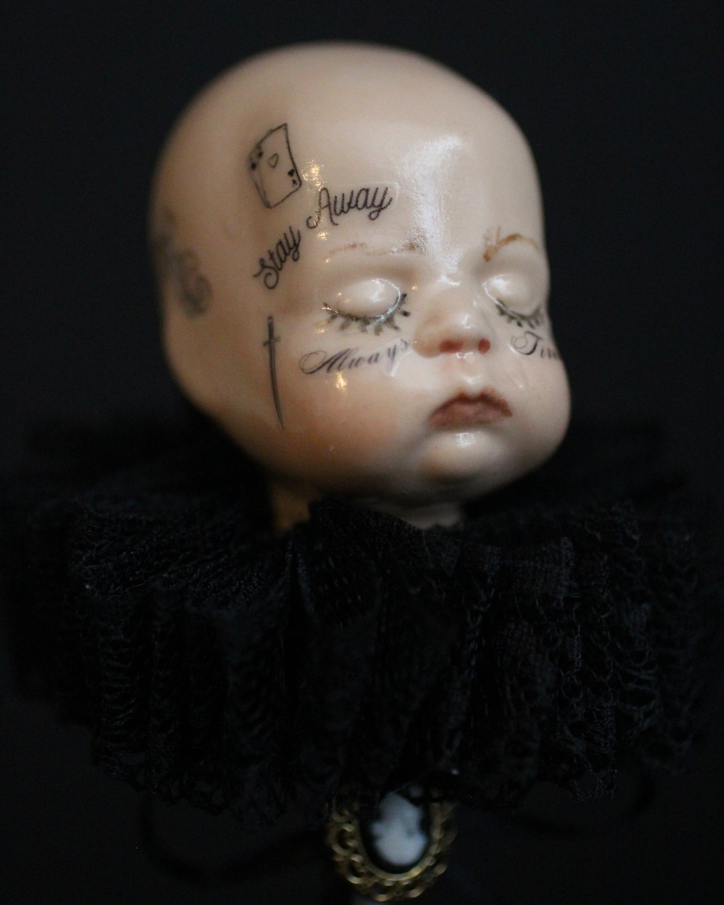 Always Tired Doll Head Sculpture
