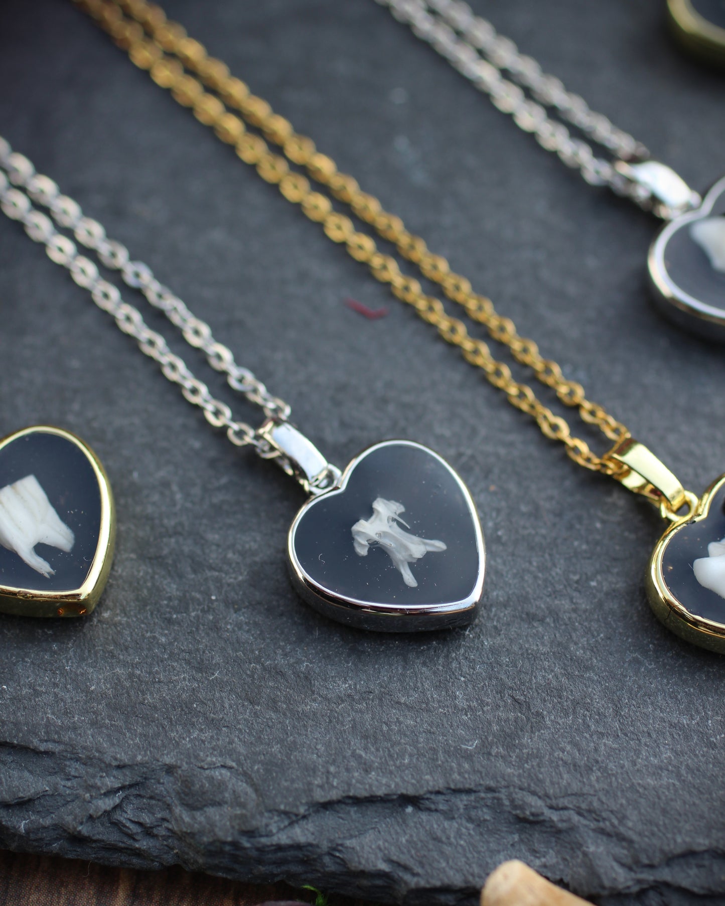 Tooth and Bone Heart Necklaces