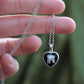 Tooth and Bone Heart Necklaces