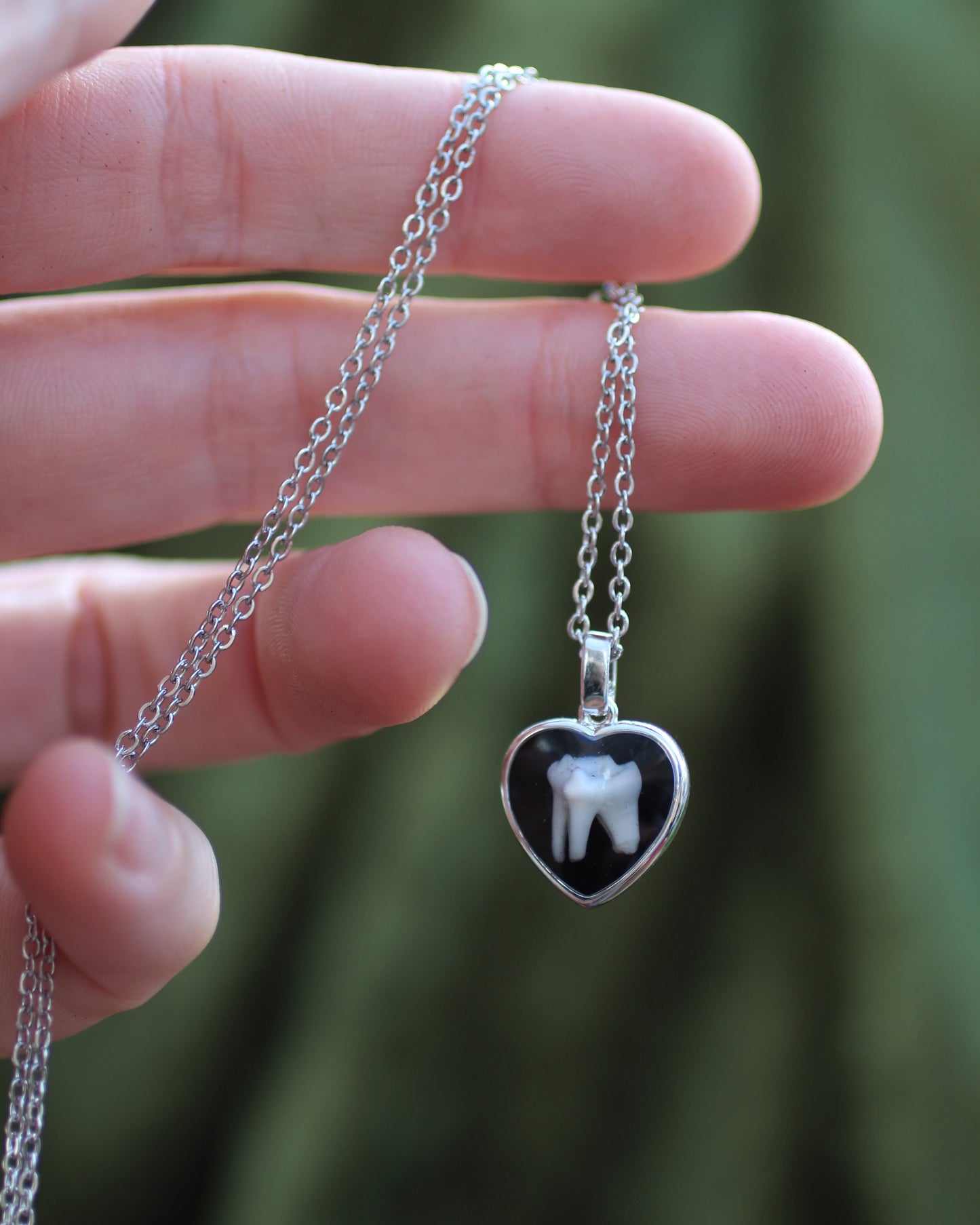 Tooth and Bone Heart Necklaces