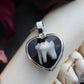 Tooth and Bone Heart Necklaces