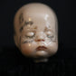 Always Tired Doll Head Sculpture
