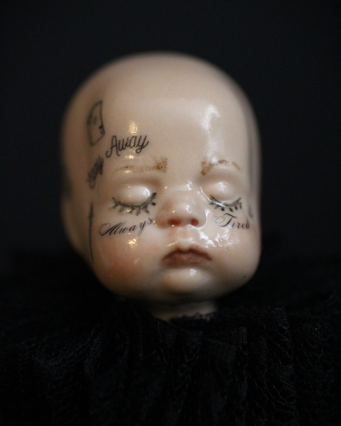 Always Tired Doll Head Sculpture