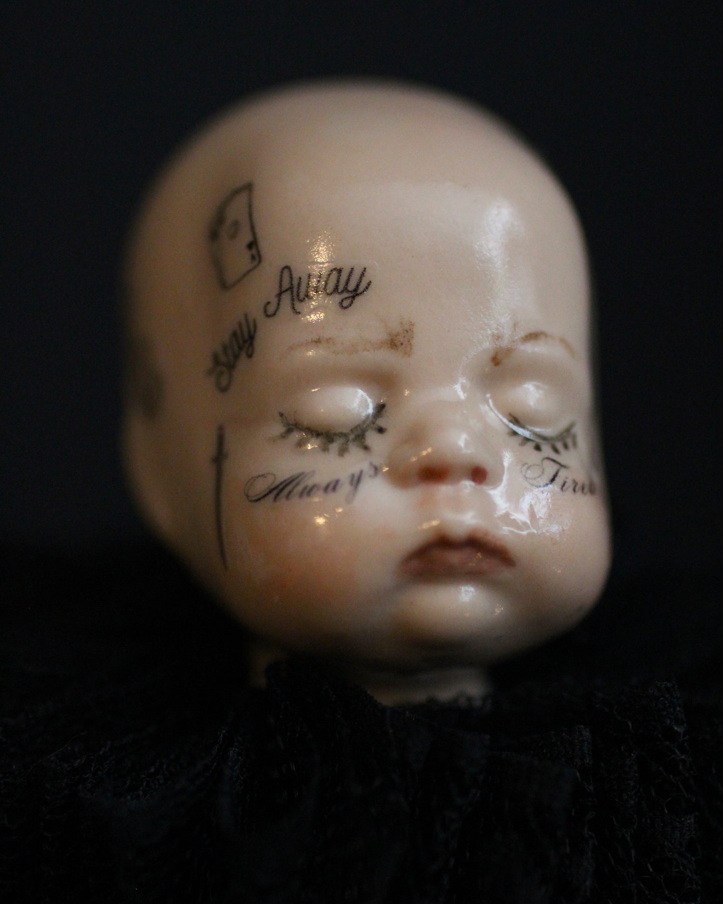 Always Tired Doll Head Sculpture