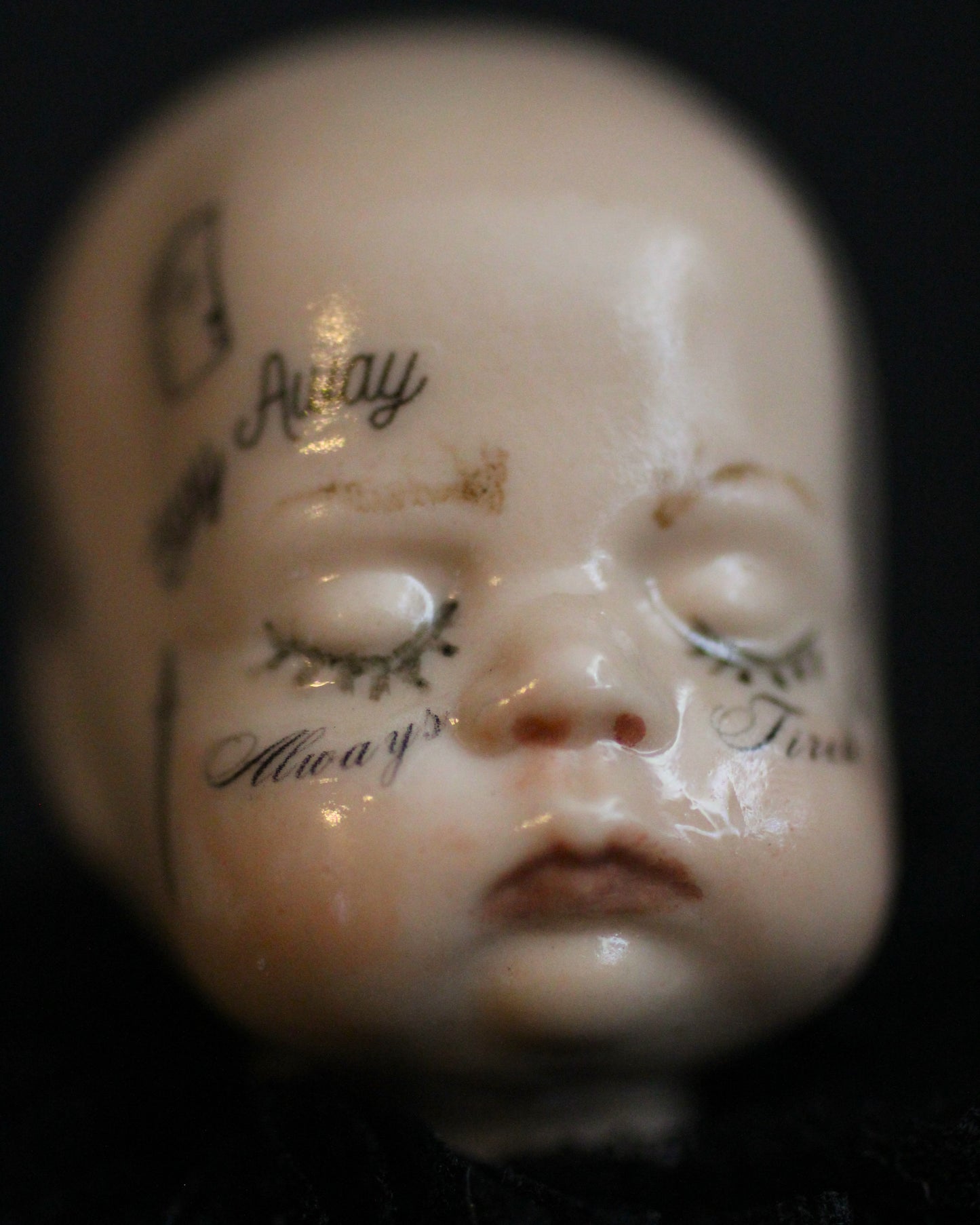 Always Tired Doll Head Sculpture