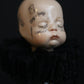 Always Tired Doll Head Sculpture