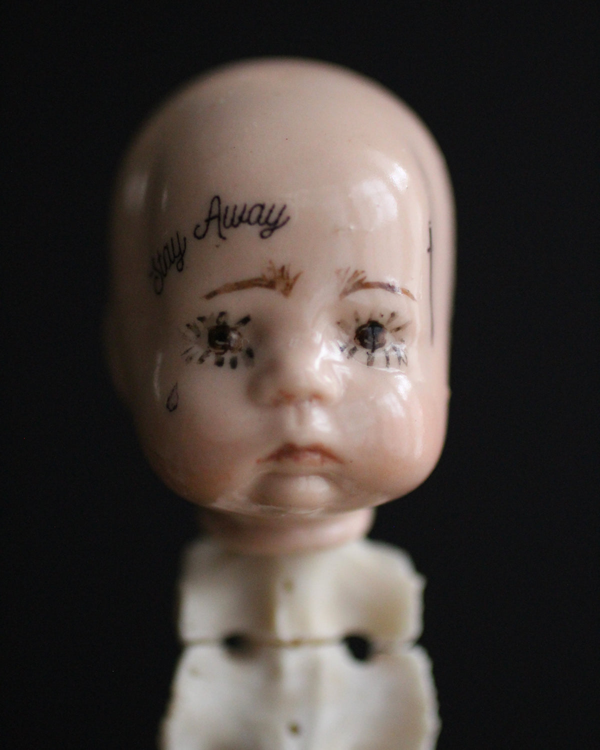 Spinal Column Doll Head Sculpture