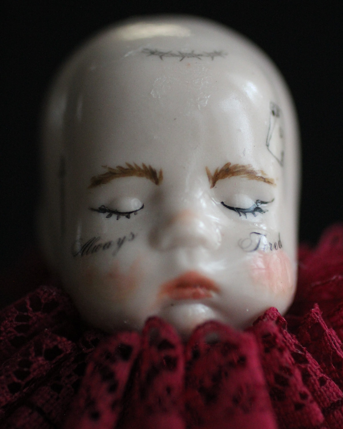 Always Tired Doll Head Sculpture