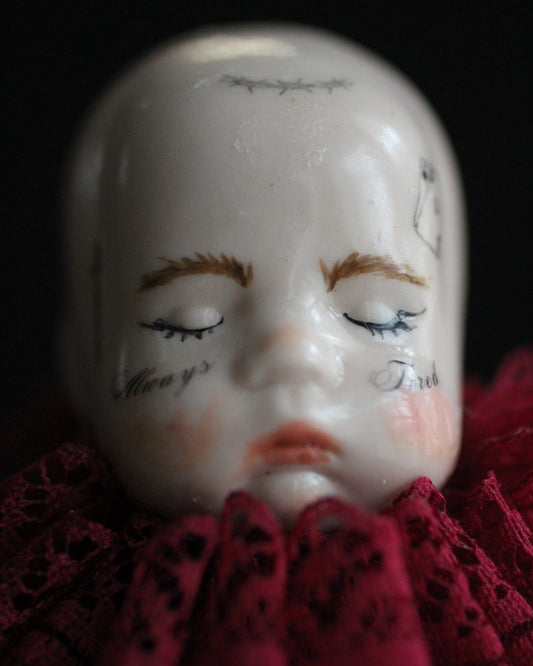 Always Tired Doll Head Sculpture