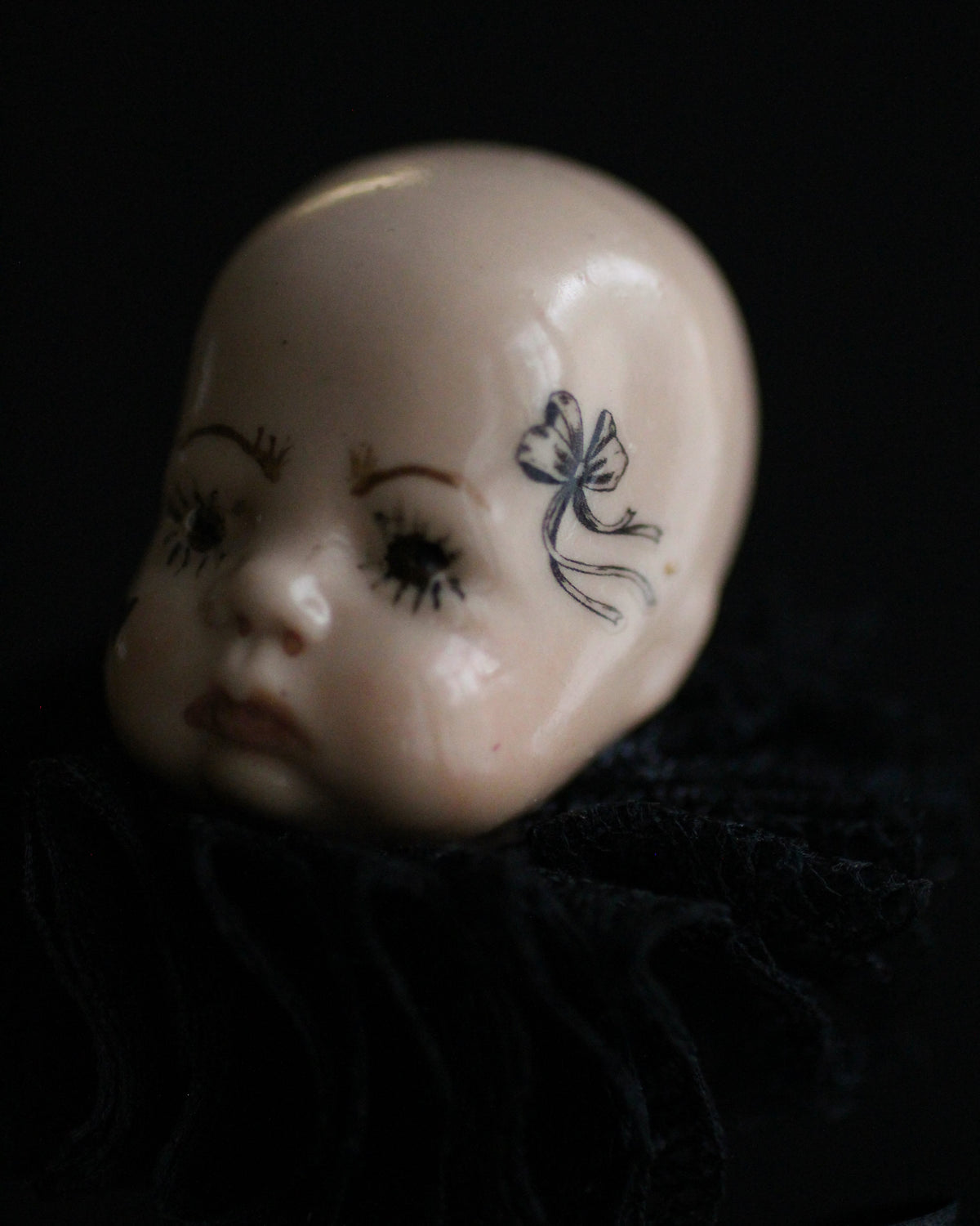 Black Candlestick Doll Head Sculpture