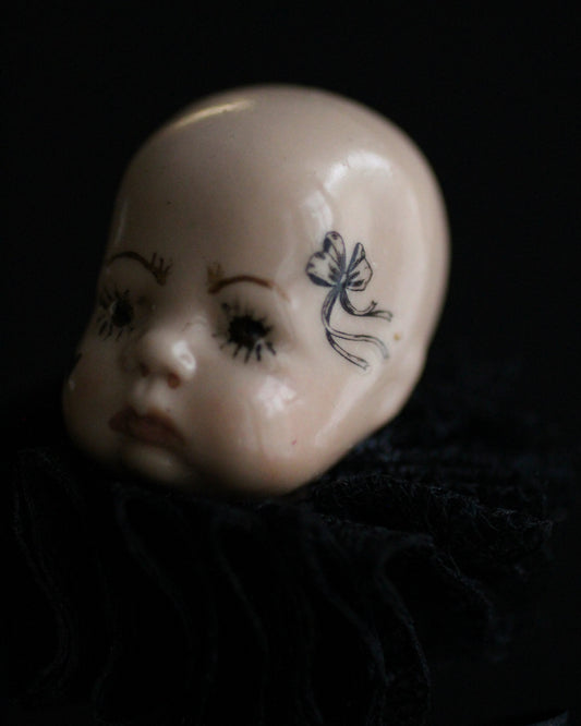 Black Candlestick Doll Head Sculpture