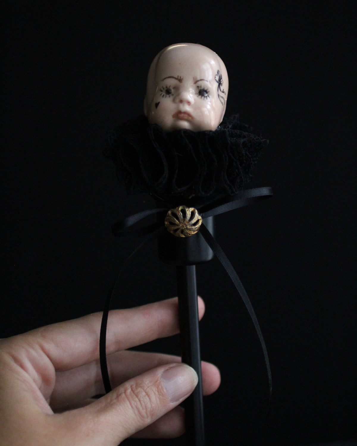Black Candlestick Doll Head Sculpture