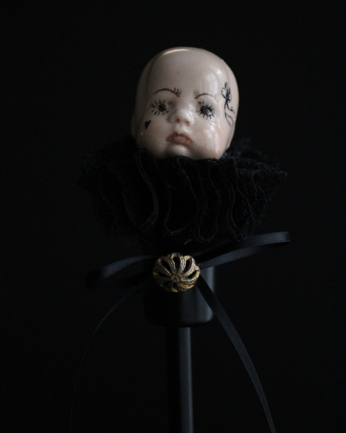 Black Candlestick Doll Head Sculpture