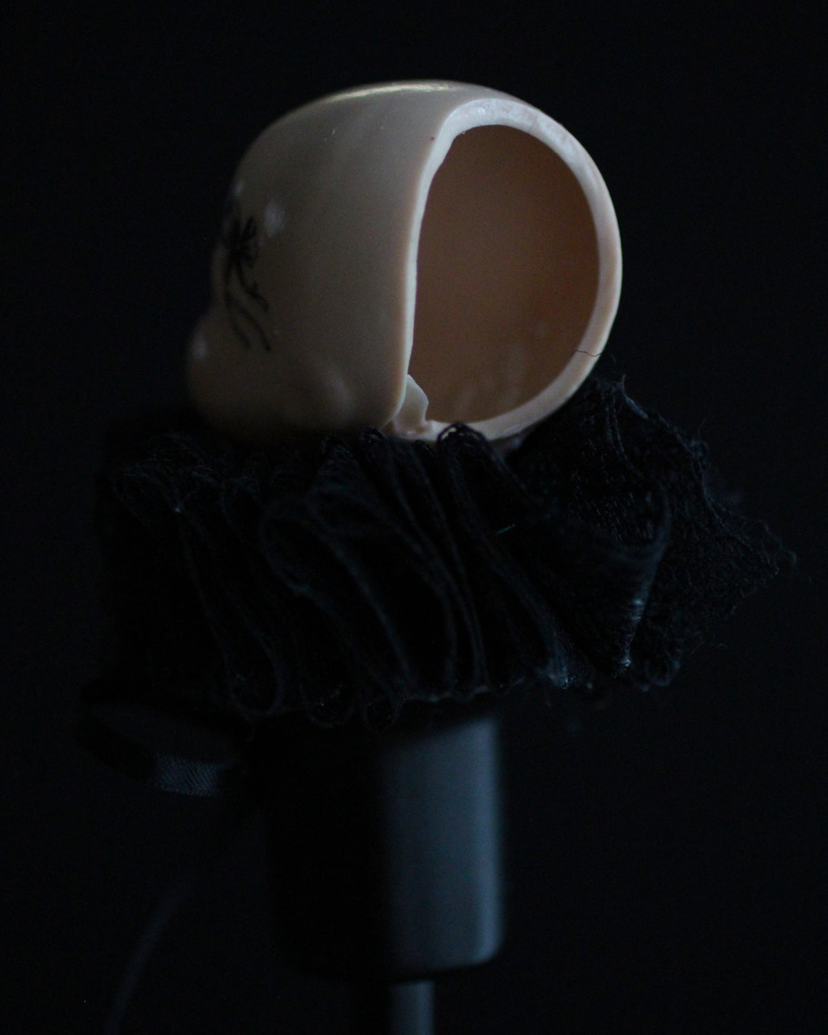Black Candlestick Doll Head Sculpture