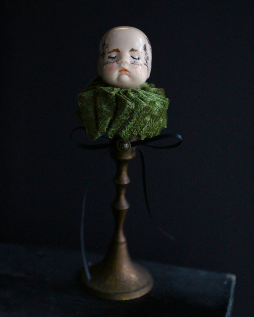 Always Tired Doll Head Sculpture